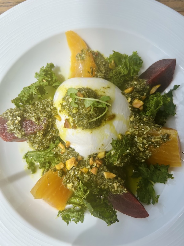 Mozzarita local burrata, kale chips, pistachio pesto, micro basil