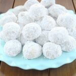 snowball cookies on a blue plate